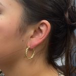 Load image into Gallery viewer, 14K Gold Twisted Hoop Earrings. GER99
