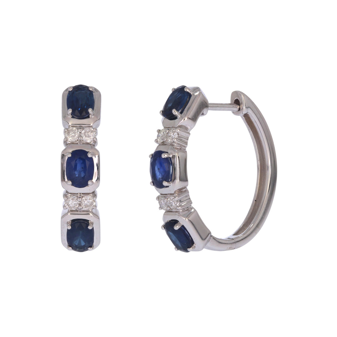 CE97504BS4X3. 14K Solid White Gold Blue Sapphire Oval Hoops