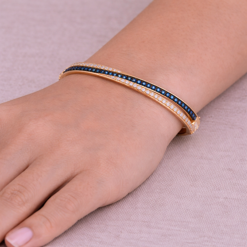 BNN68618B. 14K Solid Gold Blue Sapphire and Diamonds Twisted Bangle