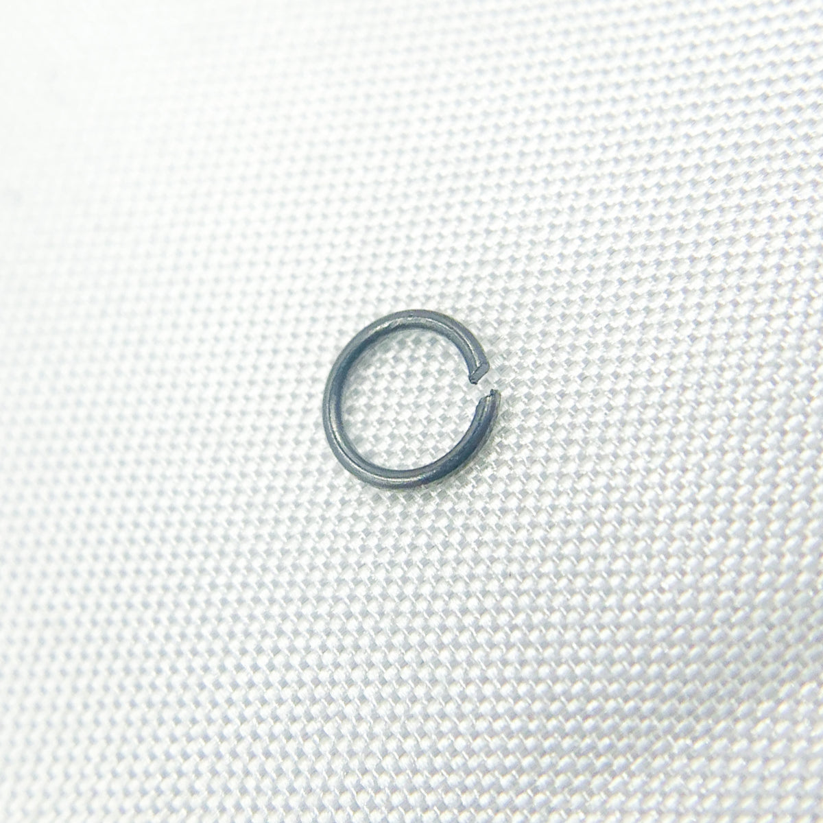 MFT060DE4BR. 4MM 22Gauge Black Rhodium Open Jump Ring