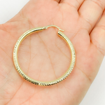 Load image into Gallery viewer, GER58. 14K Gold Hoop Earrings with Engraved Tornado Design
