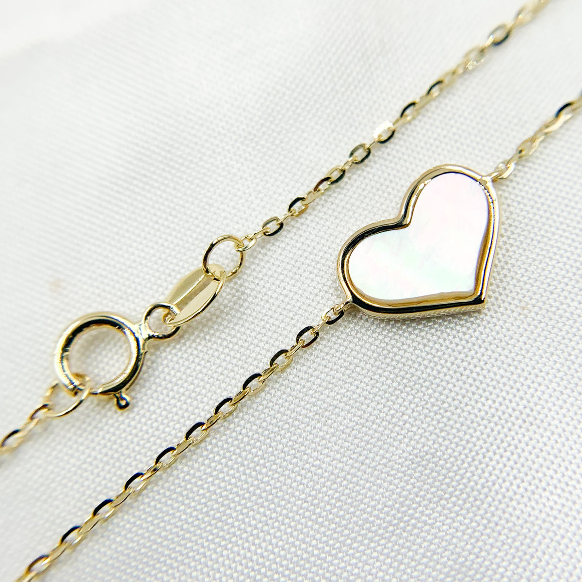 BR404076. 14K Solid Gold Mother of Pearl Heart Bracelet