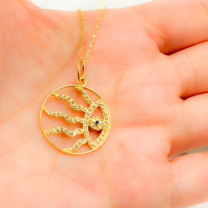 14K Gold Circle Charm Evil Eye Pendant with Diamonds and Blue Sapphire. GDP552