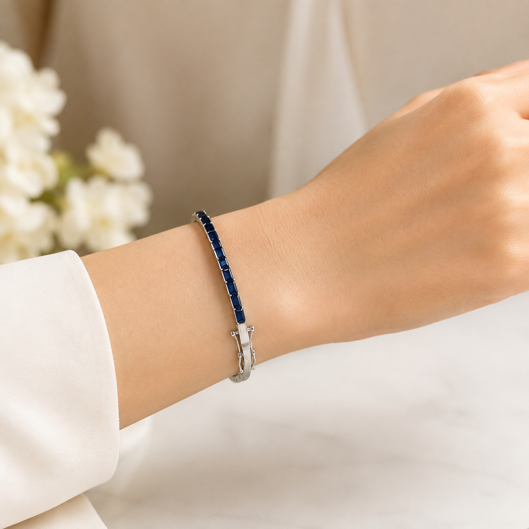 BNZ68665. 14K Solid White Gold Bangle with Blue Sapphire Baguette Stones