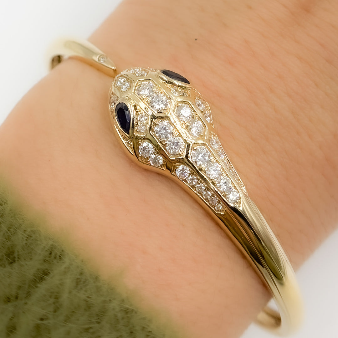 BNL68609BS. 14K Solid Yellow Gold Diamond and Blue Sapphire Snake Bangle