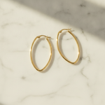 Load image into Gallery viewer, GER53. 14K Solid Gold Oval Shape Hollow Hoop Earrings