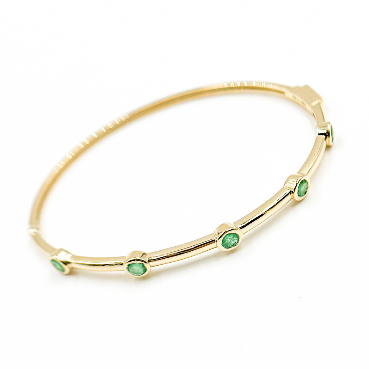 Gold and Emerald Bangle
