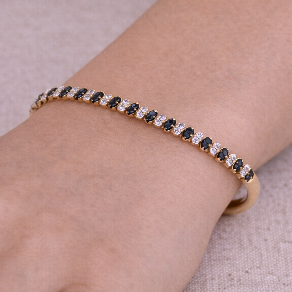BNK68620A. 14K Solid gold bangle alternating black diamonds and white diamonds