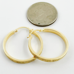 Load image into Gallery viewer, 14K Gold Flat Round Hoop Earrings with Texture. GER57
