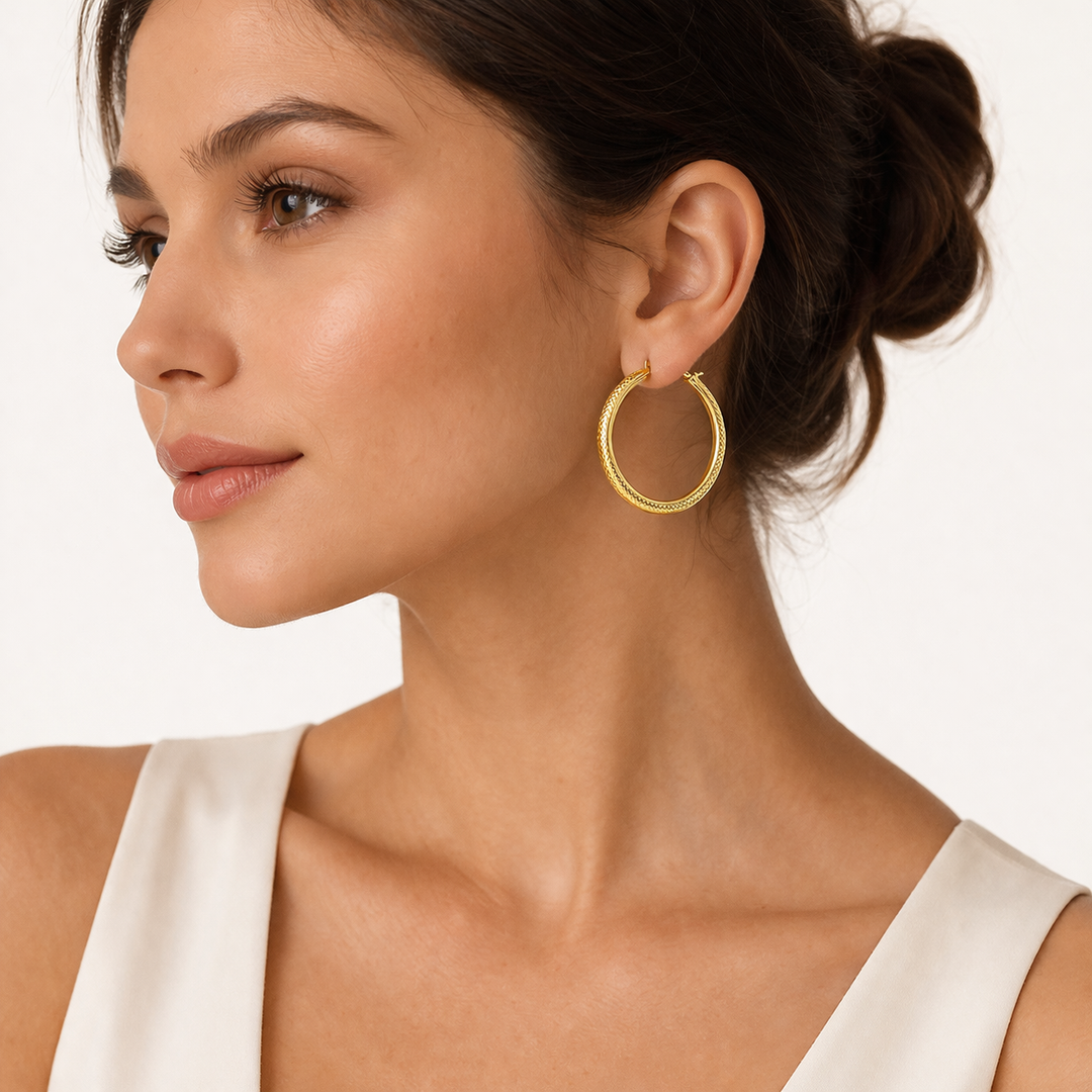 GER67. 14K Gold Hollow Hoop Earrings with Engraved Tornado Design