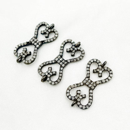 DC187. Diamond & Sterling Silver Bow Connector