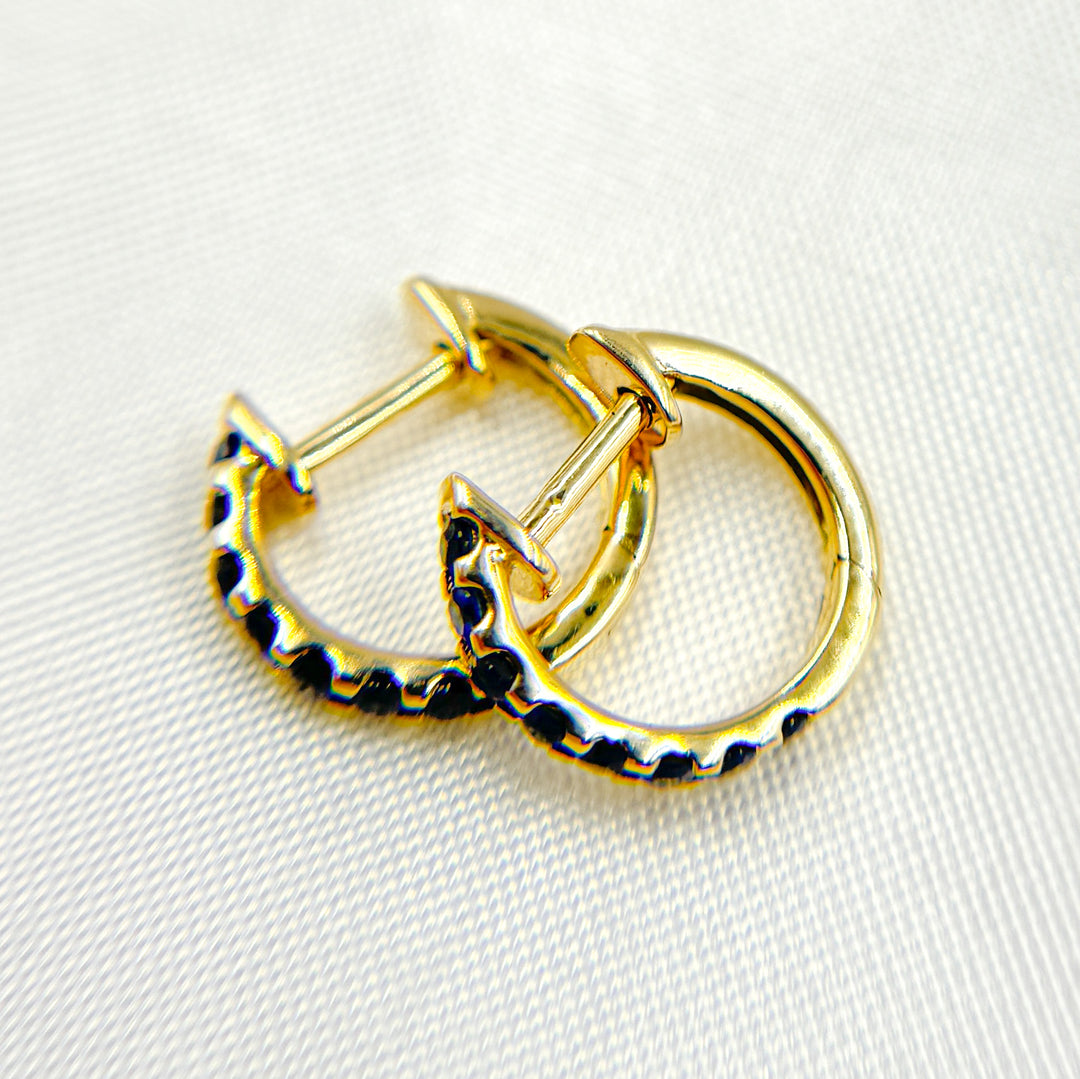 HP402531. 14K Solid Gold Blue Sapphire Huggies