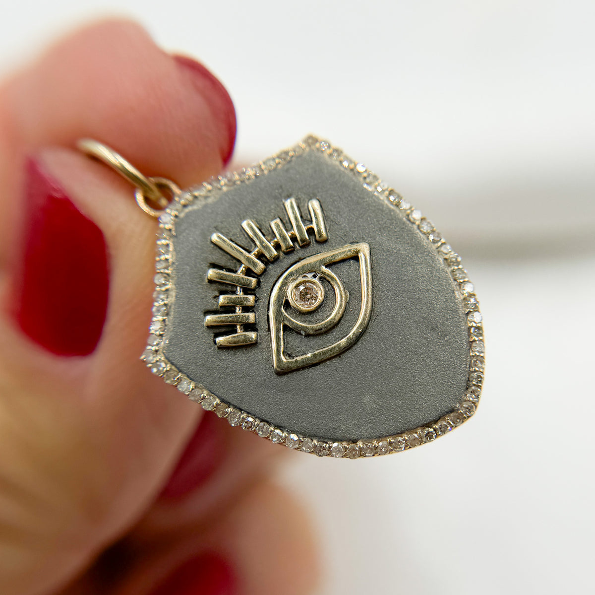 KSG73. 14k Solid Gold and Sterling Silver Shelf Eye Charm