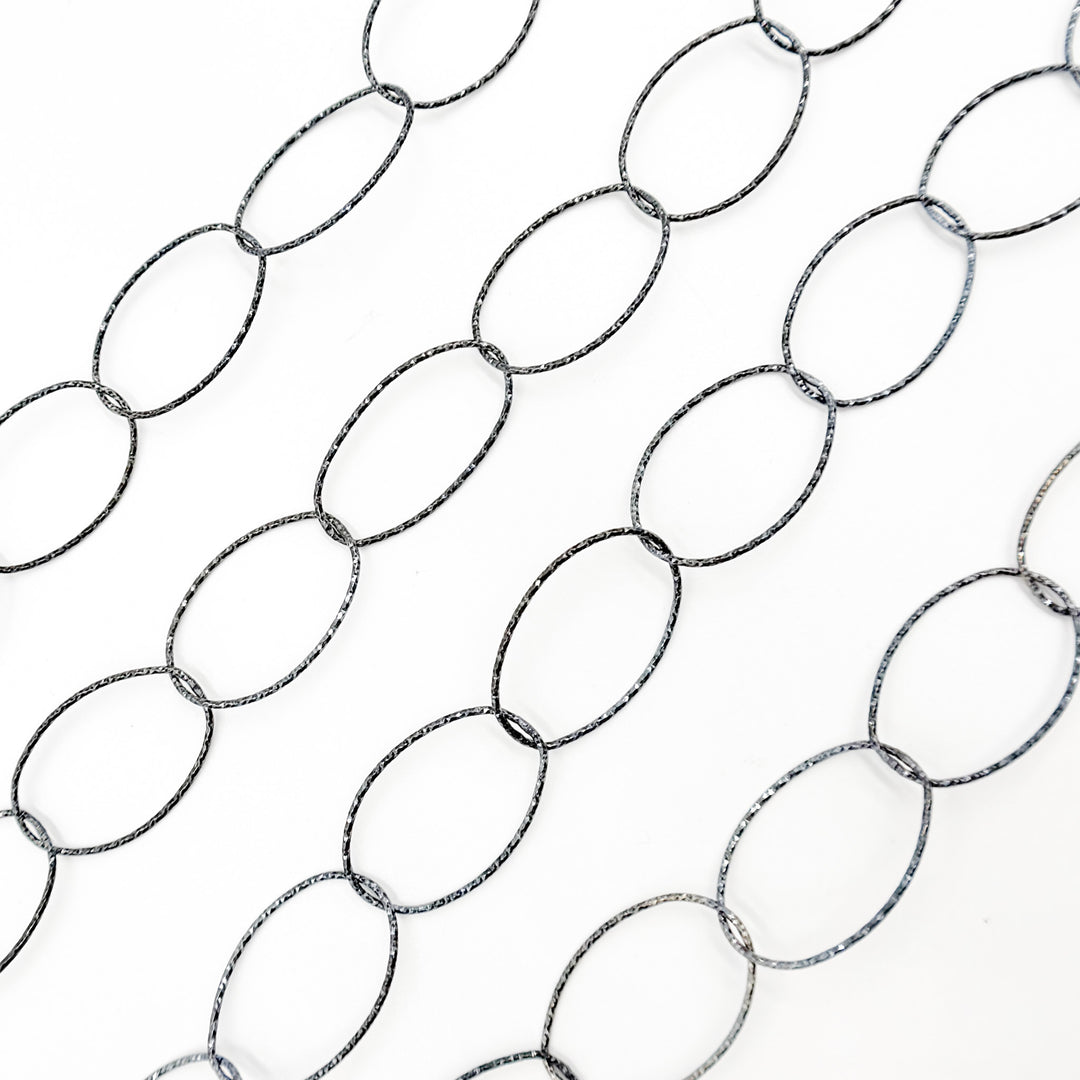 Y26BR. Sterling Silver Black Rhodium Diamond Cut Oval