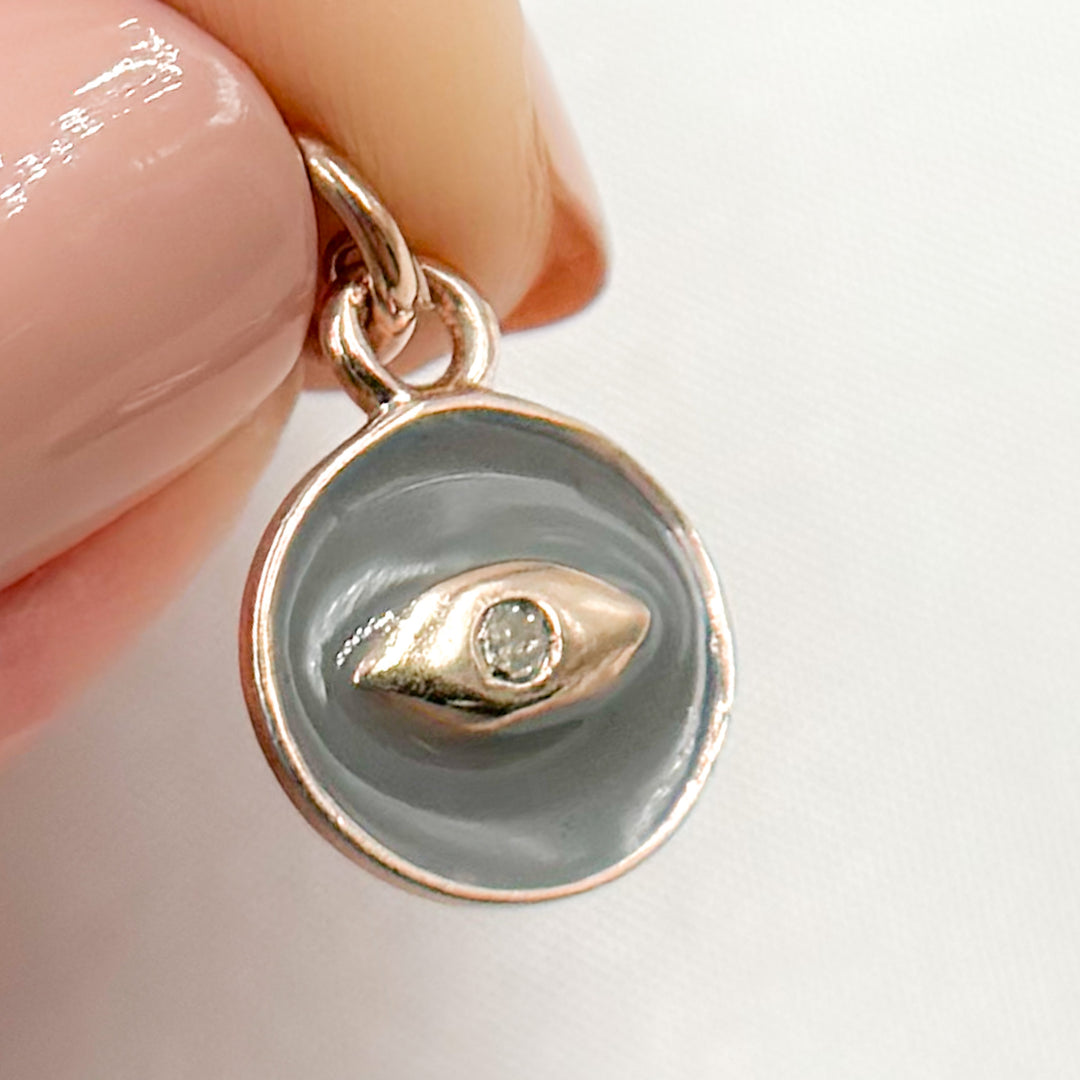 DC132A. Diamond Sterling Silver Round Eye Enamel Charm