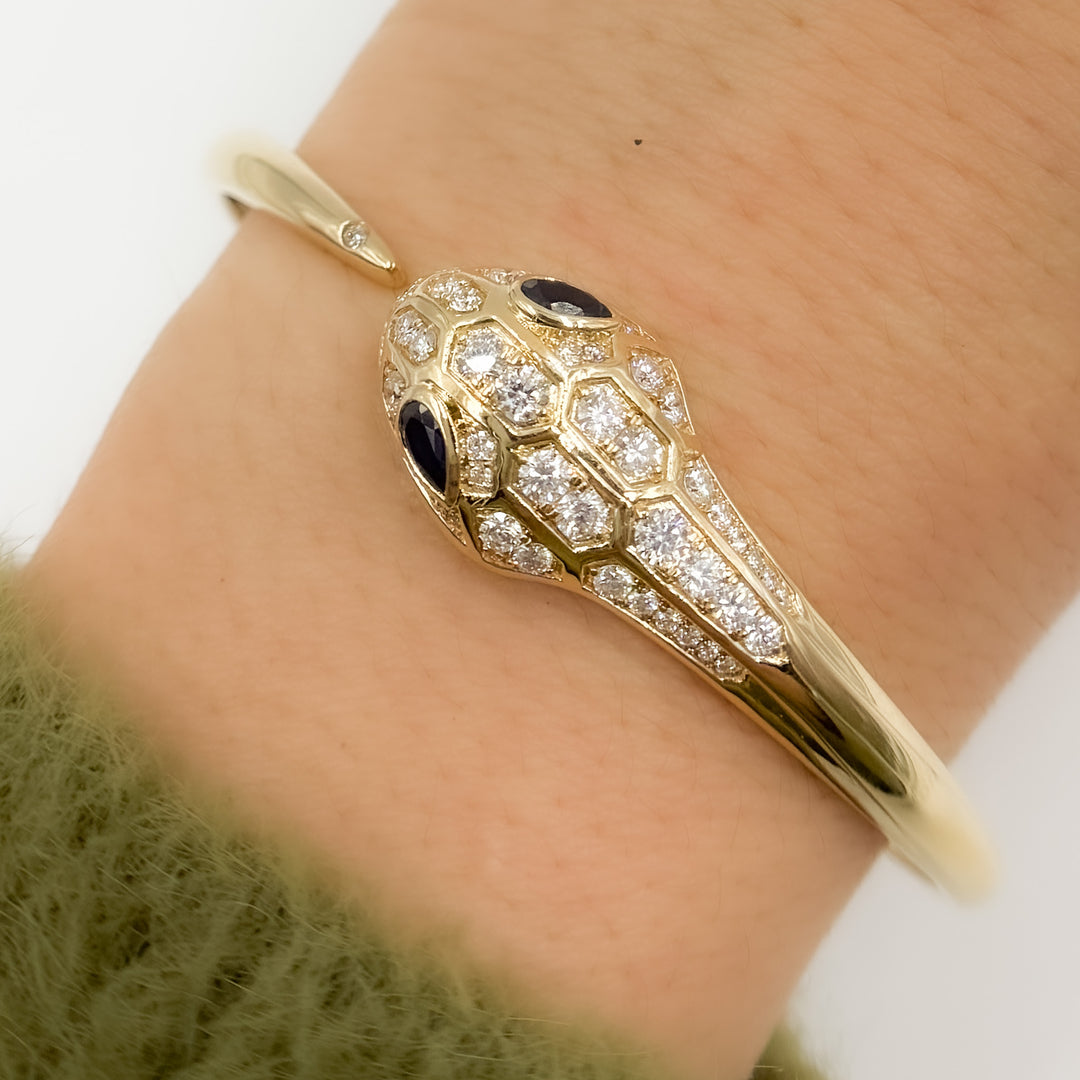 BNL68609BS. 14K Solid Yellow Gold Diamond and Blue Sapphire Snake Bangle