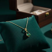 CMZ00361EM. 14K Solid Gold Drop-Shaped Emerald Charm