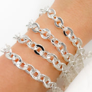 sterling silver hollow flat oval link chain.