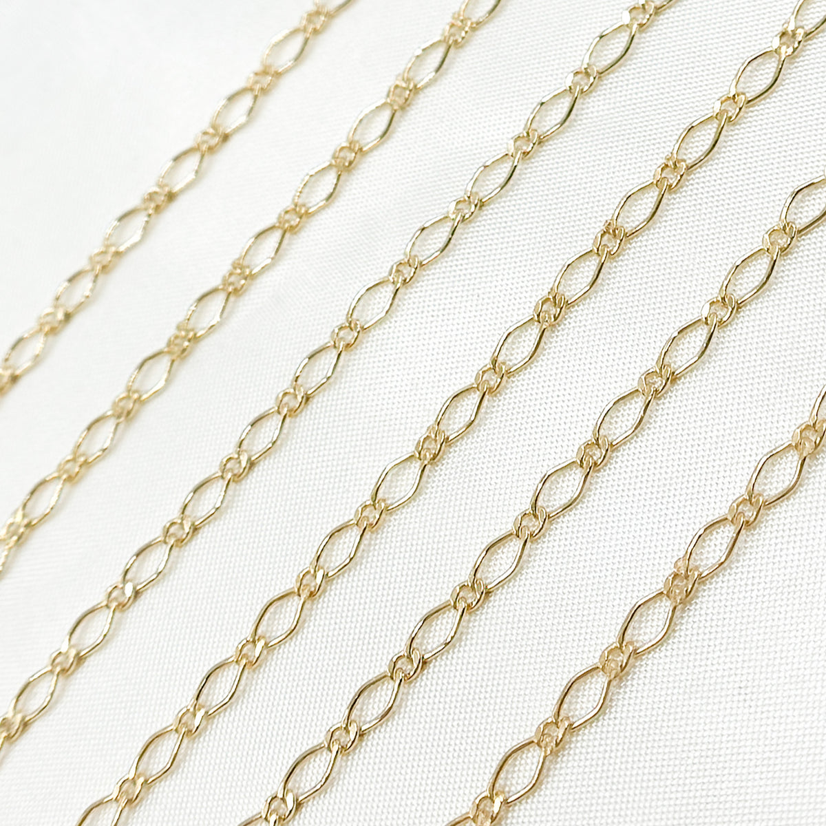 V243GF. 14k Gold-Filled Long and Short Links.