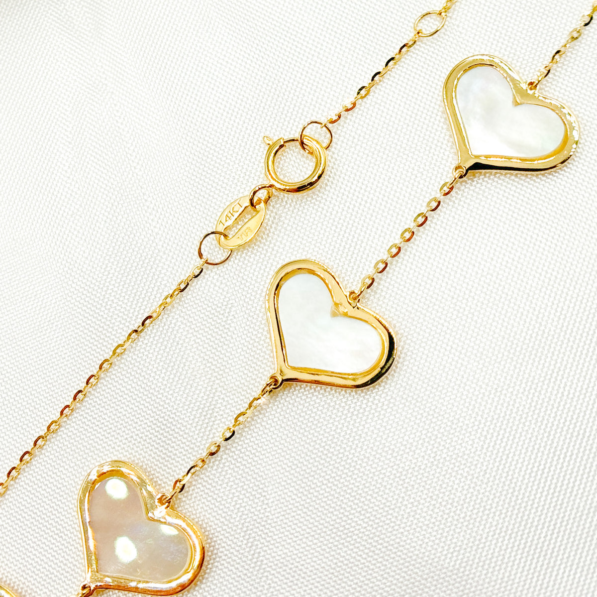 BR402583. 14K Solid Gold Mother of Pearl Heart Bracelet