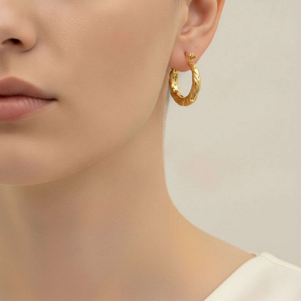 GER134. 14K Gold Twisted Hollow Hoop Earrings
