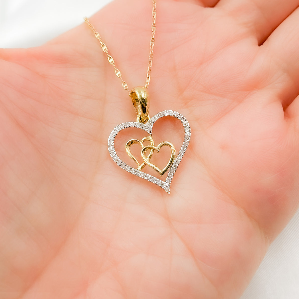 14K Solid Gold Diamond Heart Charm with Two Hearts in the Center. EJP1489