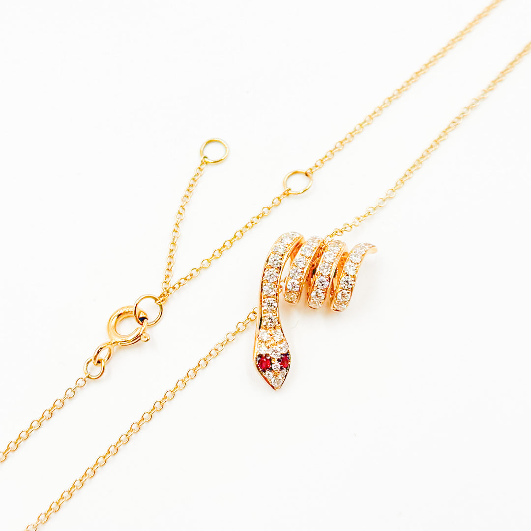 NFF72315RU. 14k Solid Gold Diamond and Ruby Snake Necklace