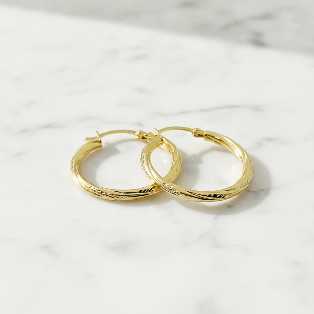GER69. 14K Gold Hollow Hoop Earrings with Engraved Tornado Design