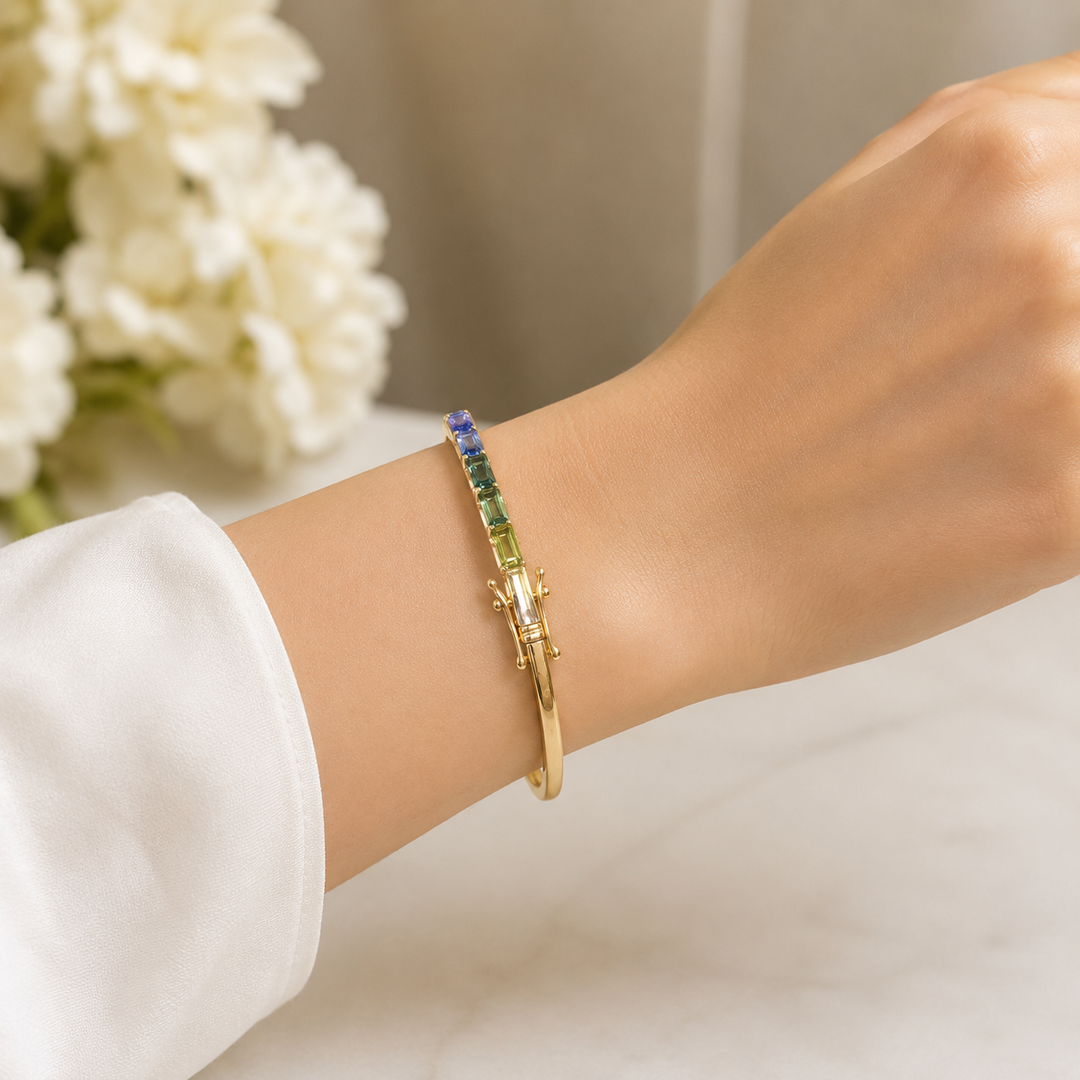CB97290. 14K Solid Yellow Gold Bangle with Multi Sapphire Baguette Stones