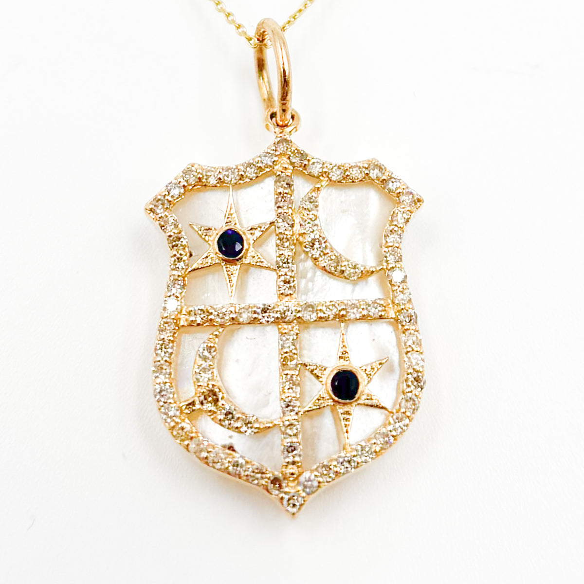 Buy Now Gold Shield Pendant