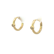 HP400760Y. 14K Solid Gold Diamond Huggies Earrings