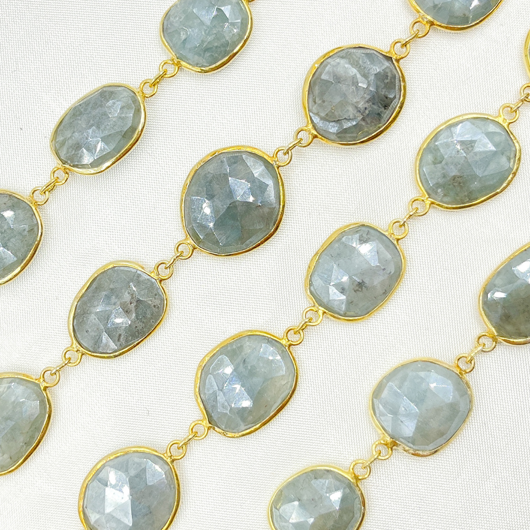 AQU10. Coated Aquamarine Organic Shape Bezel Gold Plated Wire Chain