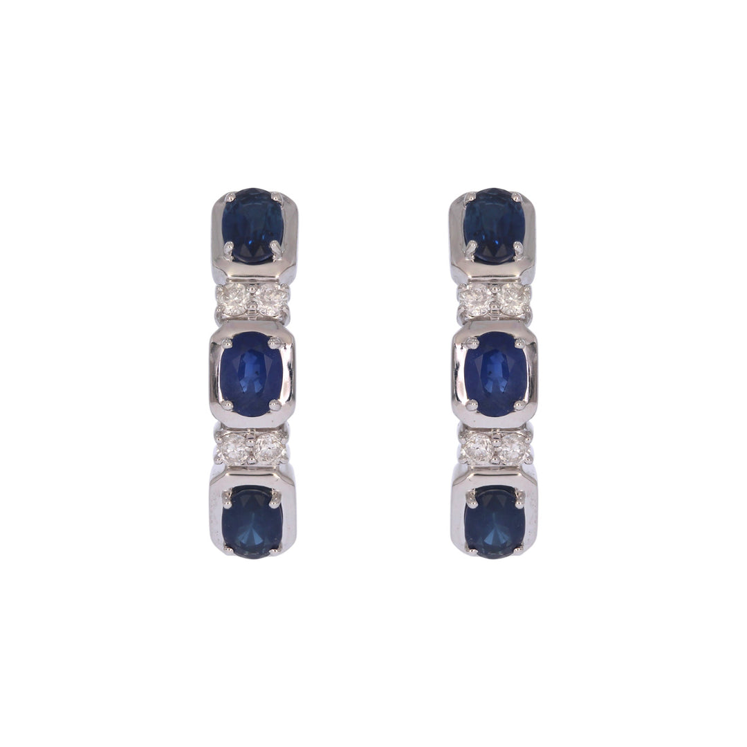 CE97504BS4X3. 14K Solid White Gold Blue Sapphire Oval Hoops