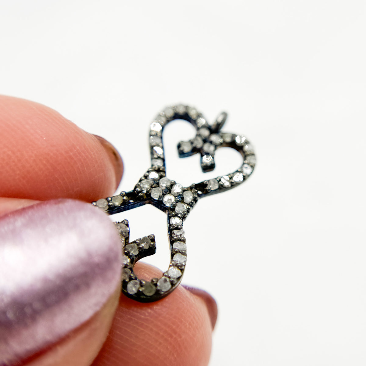 DC187. Diamond & Sterling Silver Bow Connector
