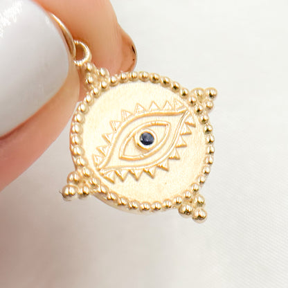 Shop Now Gold Round Eye Charm with Gemstone