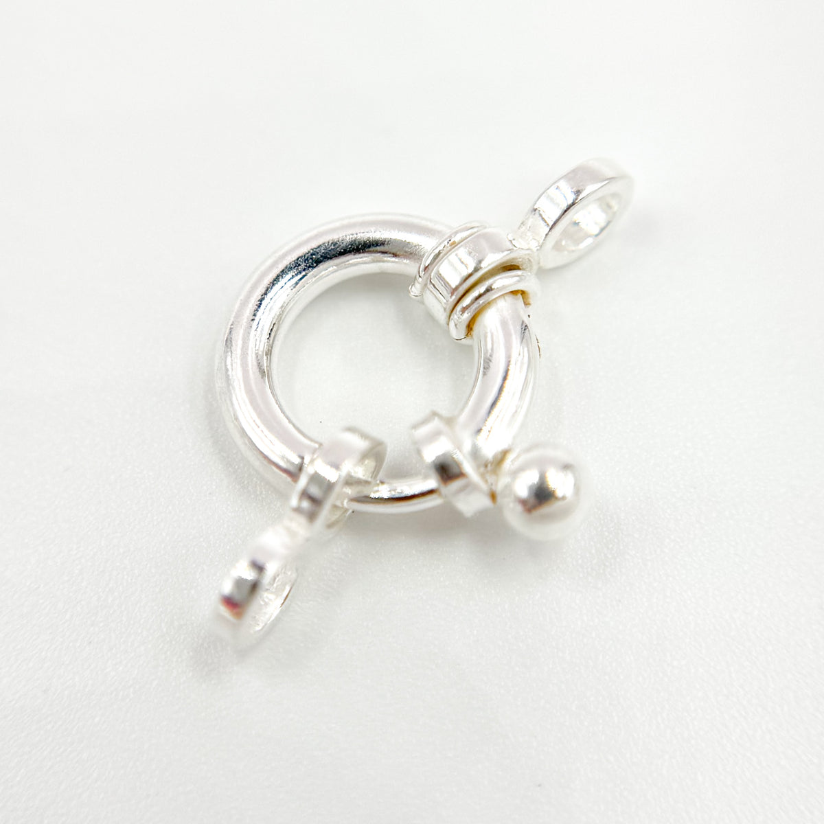 HSRL12SS. 12MM White Sterling Silver Spring Ring