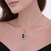 CMC00362BS. 14K Solid Gold Oval-Shaped Blue Sapphire and Diamond Charm