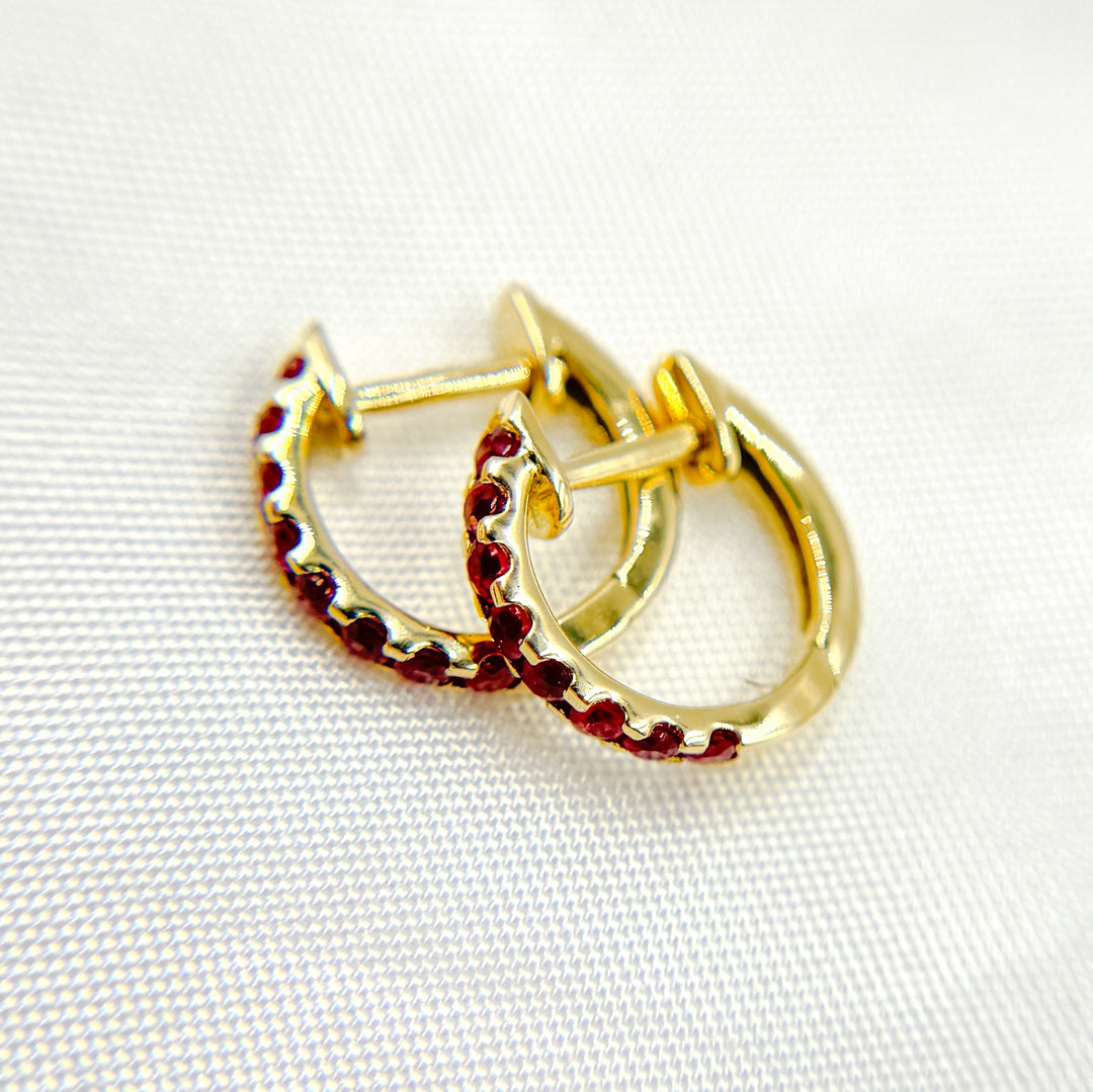 HP402531. 14K Solid Gold Blue Sapphire Huggies