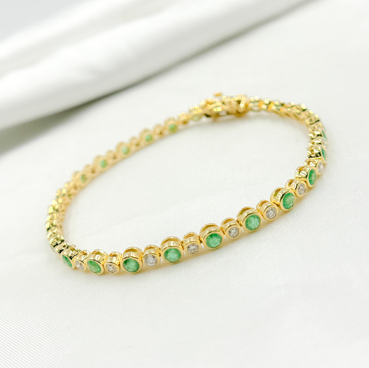 BTL65122EM. 14k Solid Gold Diamond and Gemstone Tennis Bracelet