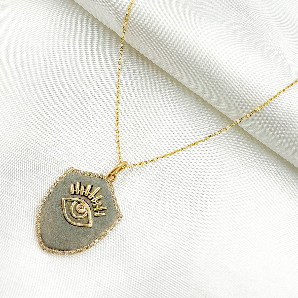 KSG73. 14k Solid Gold and Sterling Silver Shelf Eye Charm