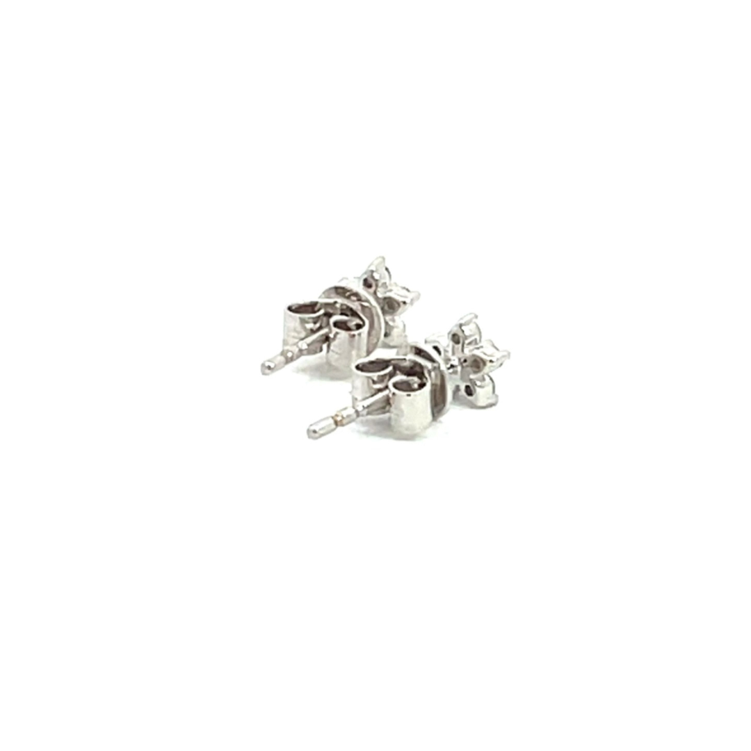 ER412616W. 14k Solid White Gold Diamond Flower Studs