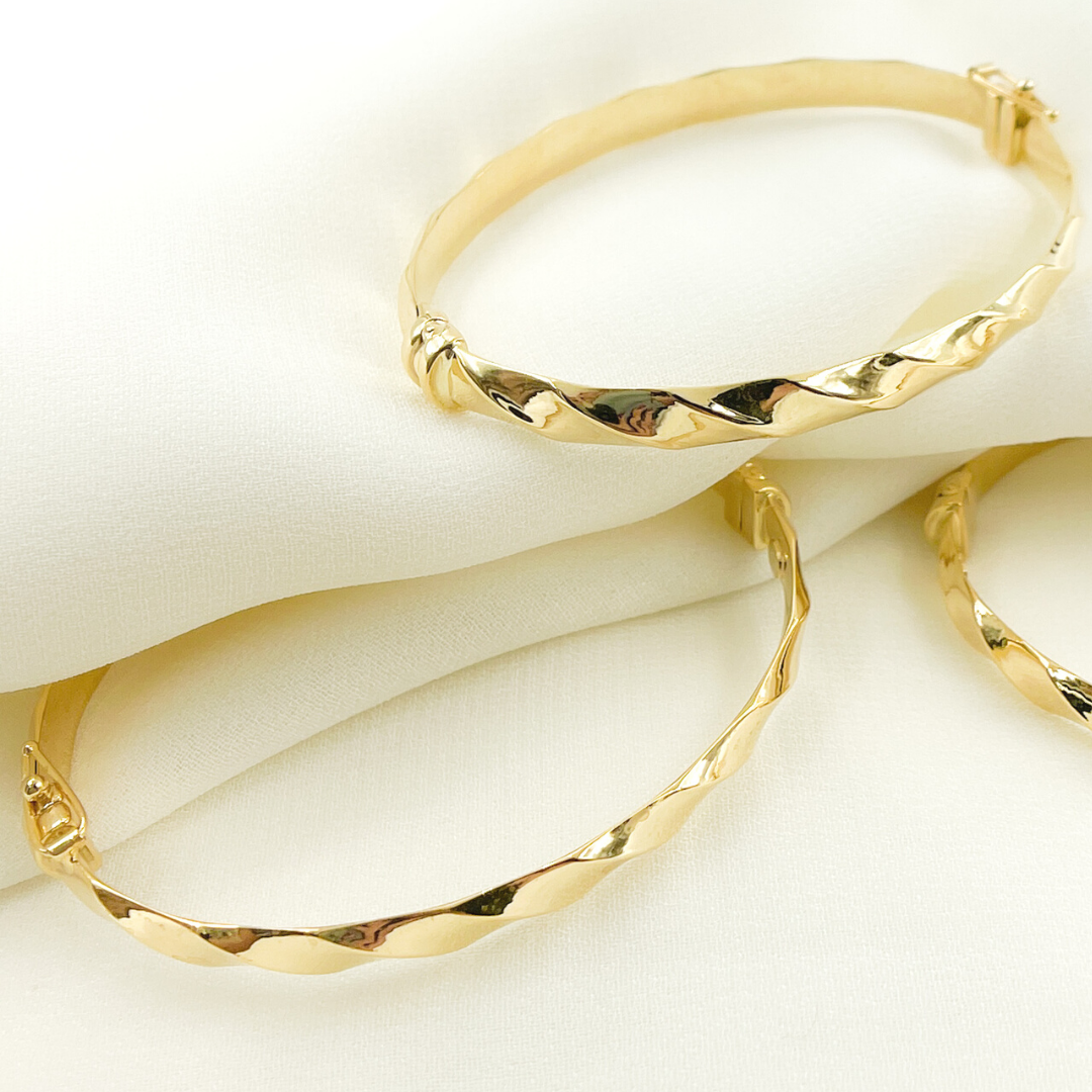 KG105. 14K Solid Gold Twisted Bangle