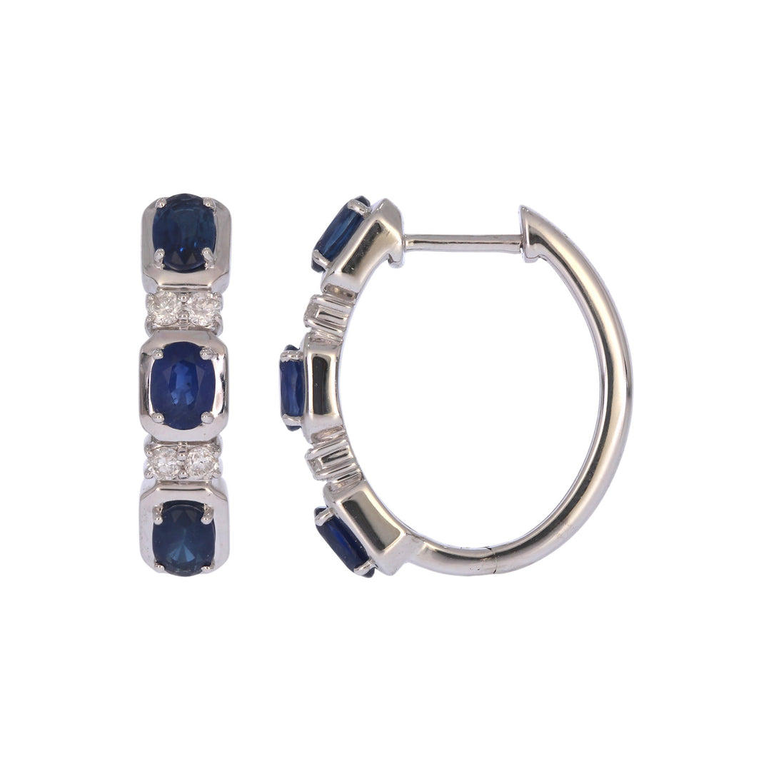 CE97504BS4X3. 14K Solid White Gold Blue Sapphire Oval Hoops