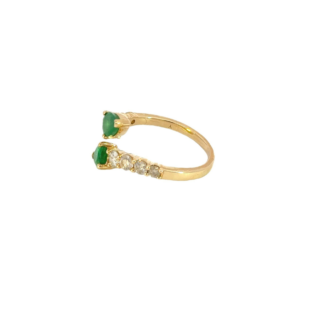 14k Solid Gold Spiral Diamond and Emerald Ring.