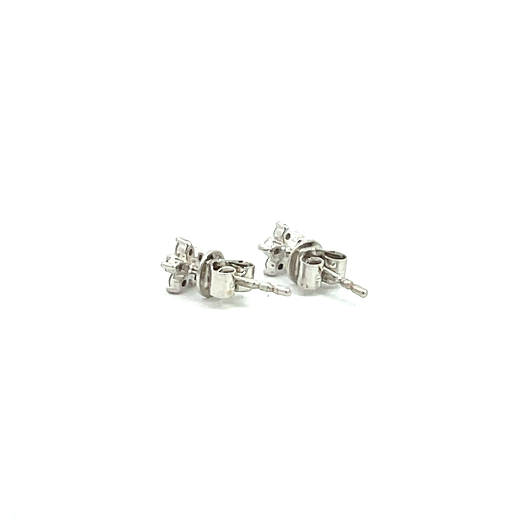 ER412616W. 14k Solid White Gold Diamond Flower Studs