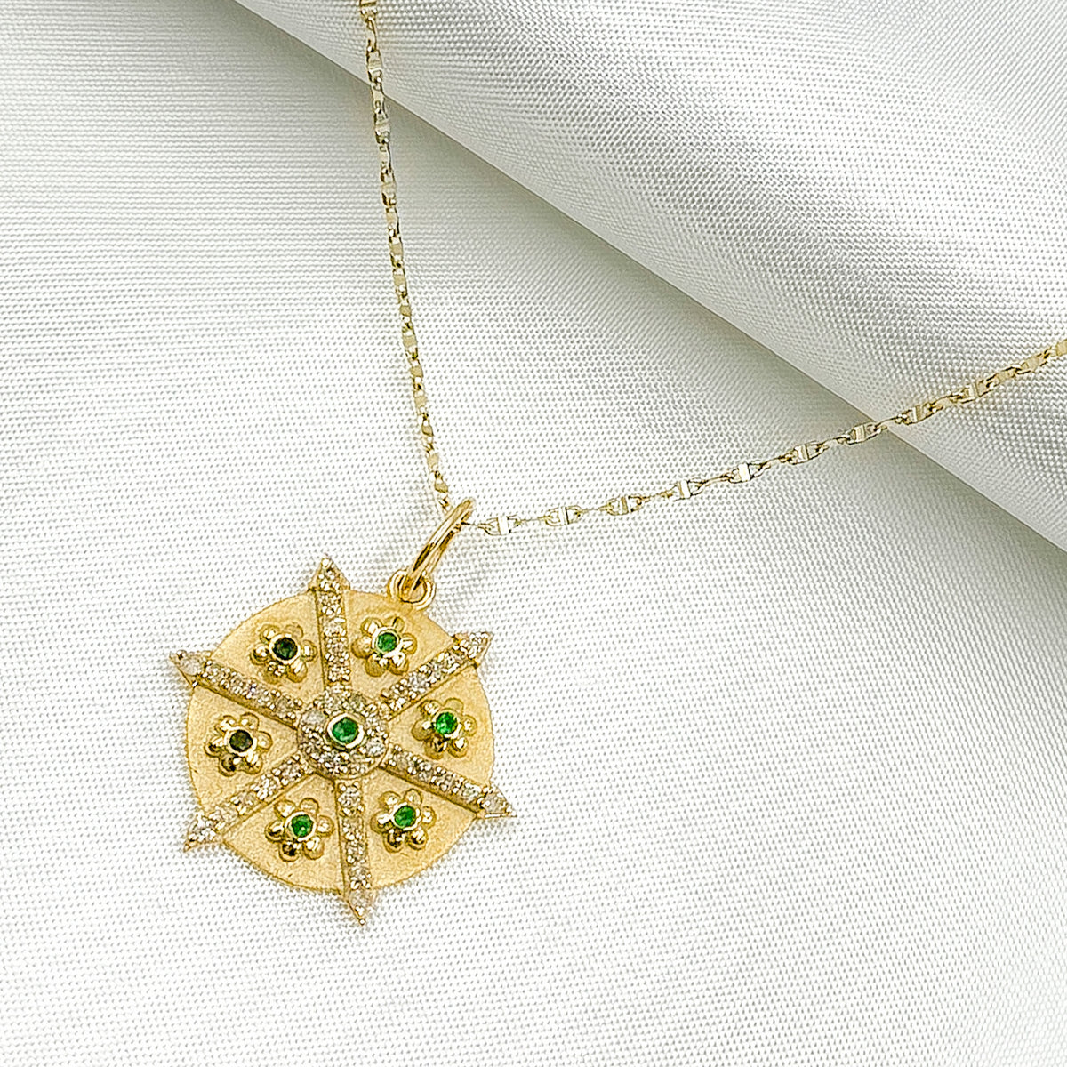 14K Solid Gold Diamonds and Gemstones Circle Charm with Flowers between Arrows. GDP619