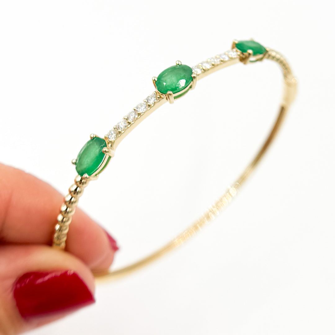 BNF68583EM. 14k Solid Gold Diamond and Emerald Bangle