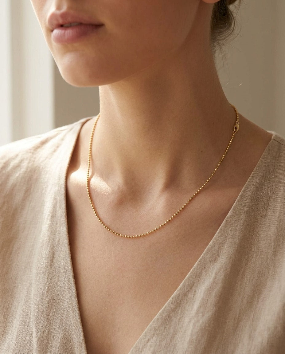 100CP. 14K Solid Gold Ball Necklace