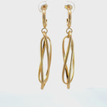 Load and play video in Gallery viewer, 15850023044. 14K Solid Gold Twist Triple Oval Hollow Dangle Earrings
