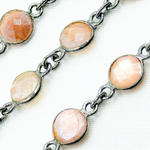 Load image into Gallery viewer, Coated Peach Moonstone Round Shape Bezel Oxidized Wire Chain. CMS17
